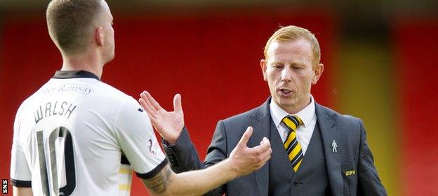 Dumbarton manager Stephen Aitken and midfielder Tom Walsh