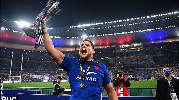 Paul Willemse of France celebrates with the Six Nations trophy