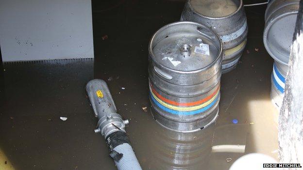 Flooded beer cellar at Crown and Anchor Inn in Brighton