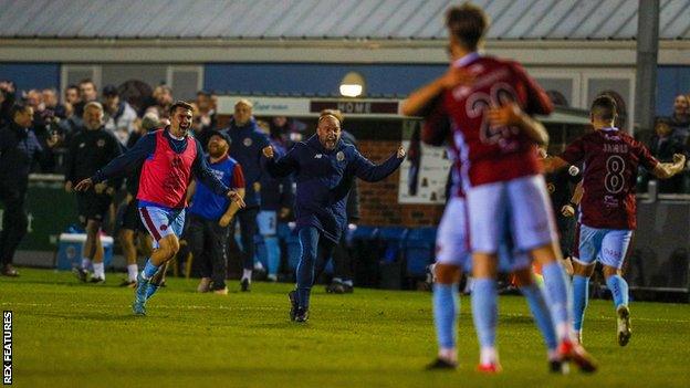 Taunton players celebrate their win over Yeovil Town