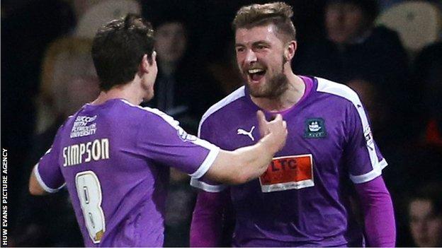 Ryan Brunt celebrates his goal at Rodney Parade