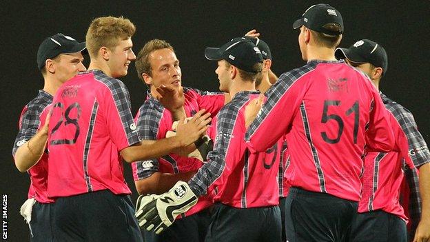 Scotland players celebrate a wicket