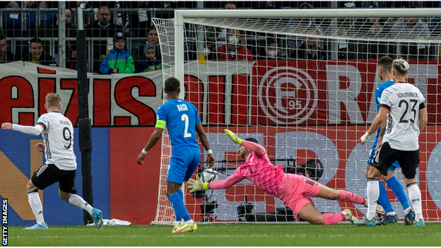 Timo Werner scores for Germany against Israel in a friendly