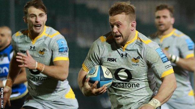 Tom Cruse runs with the ball for Wasps