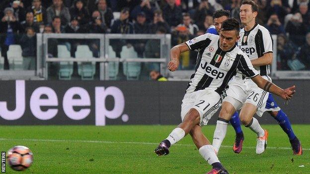 Paulo Dybala scores a penalty for Juventus