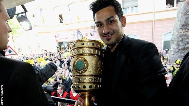 Ilkay Gundogan on an open-top bus tour with Dortmund in 2012