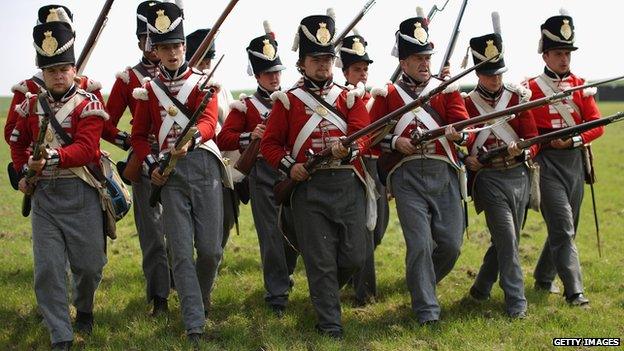 Historical re-enactors representing the British soldiers in the battle of Waterloo on 17 June 2015