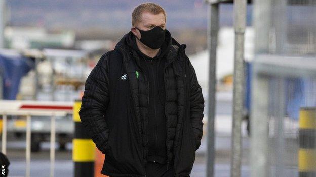 Neil Lennon at Glasgow Airport