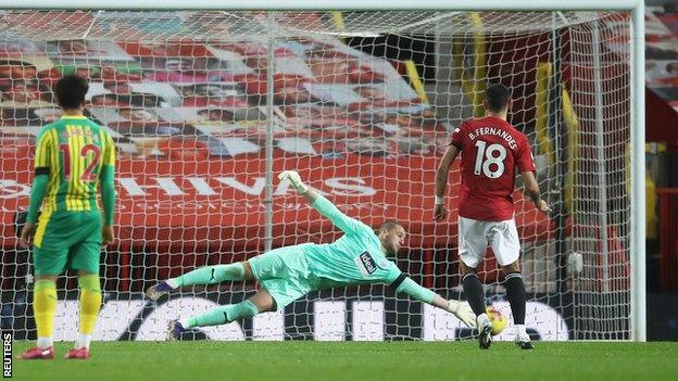 Sam Johnstone saving Bruno Fernandes' penalty