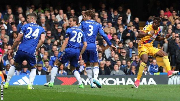 Wilfried Zaha scores Crystal Palace's equaliser against Chelsea