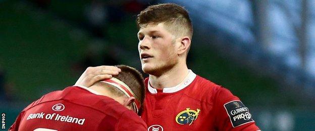 Munster's Jack O'Donoghue consoles team-mate CJ Stander after the Aviva Stadium contest