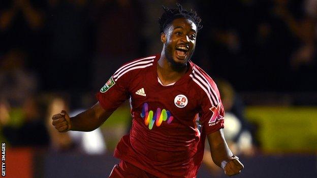 James Balagizi celebrates scoring for Crawley