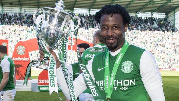 Efe Ambrose celebrates with the Scottish Championship trophy