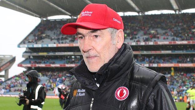 Tyrone manager Mickey Harte walks off the pitch after Sunday's semi-final