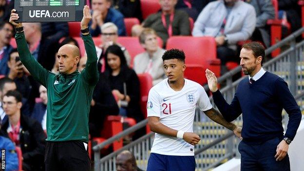 England winger Jadon Sancho prepares to come on for England against Bulgaria