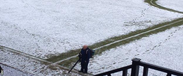 Snow covers the Somerset Park pitch