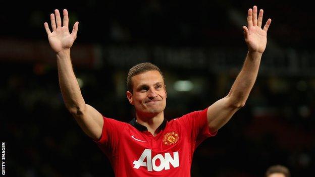 Nemanja Vidic waving to the Manchester United fans