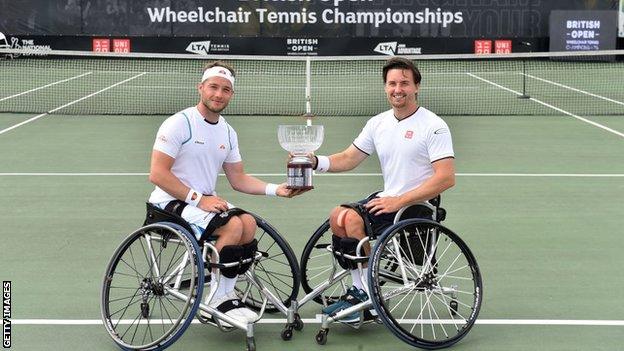 Alfie Hewett and Gordon Reid of Great Britain hold the men’s doubles British Open Wheelchair Trophy