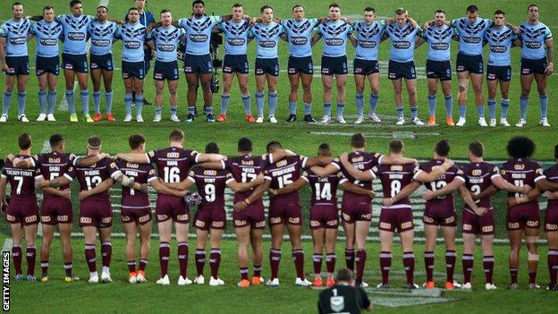 Players at the anthem