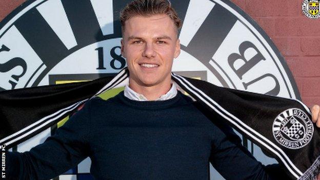 Cody Cooke poses with a St Mirren scarf