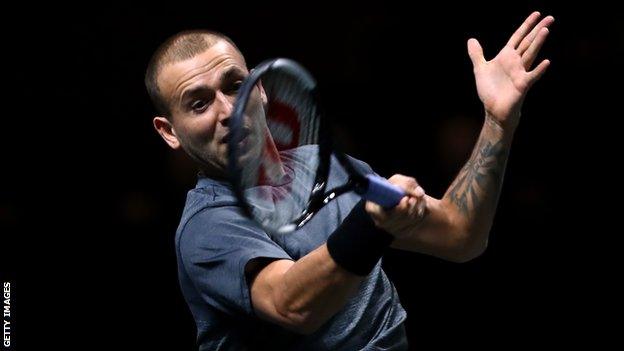 Britain's Dan Evans in action in Rotterdam