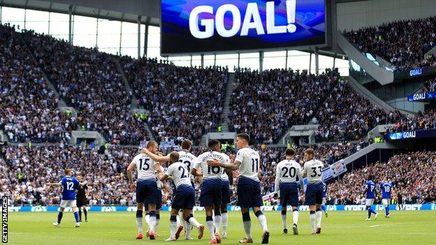 Spurs players celebrate scoring against Everton