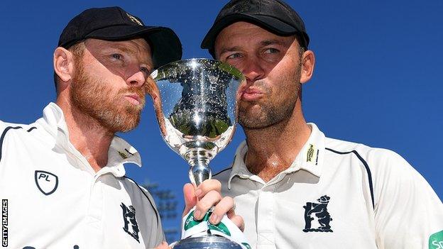 Ian Bell (left) poses with the Division Two trophy