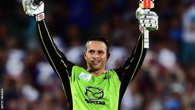 Usman Khawaja celebrates his century