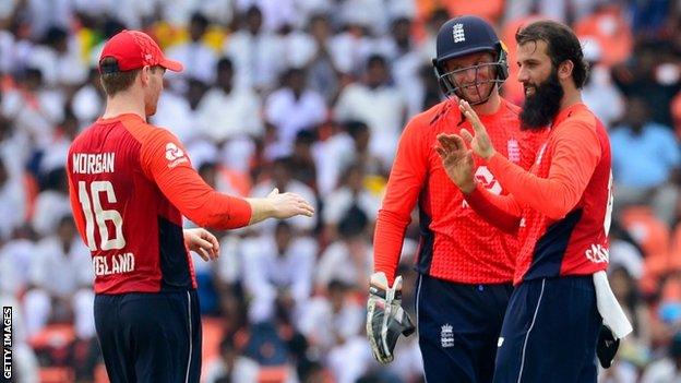 Eoin Morgan, Jos Buttler and Moeen Ali celebrate after the latter takes a wicket in England's victory over Sri Lanka