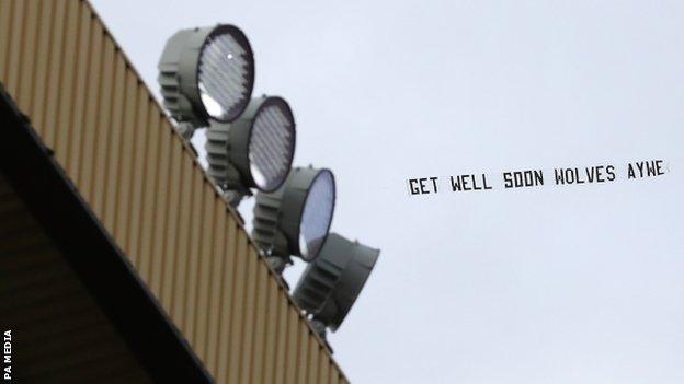 Wolves banner with a 'get well soon' message for Raul Jimenez