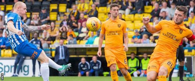 Chris Burke has a shot for Kilmarnock against Livingston