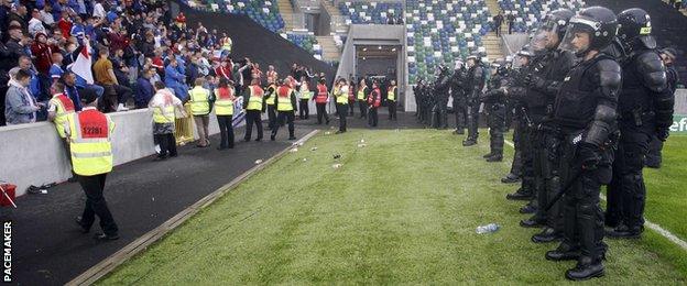 Police in riot gear moved in after the final whistle in Belfast