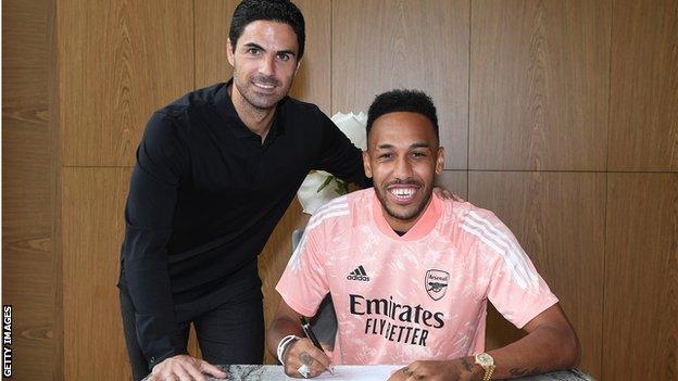 Mikel Arteta poses with Pierre-Emerick Aubameyang after the Arsenal striker signs a new contract