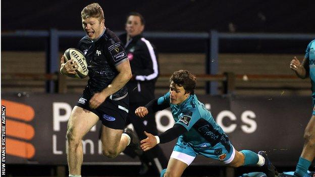 Ospreys centre Keiran Williams sprint away for his second try against Dragons