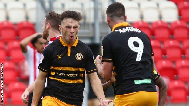 Mark Harris of Newport County celebrates his goal