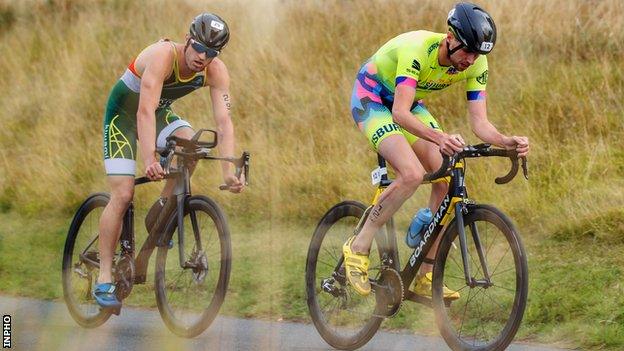 James Edgar (right) leads South African's Dylan Nortje during the bike ride in the Dublin City Triathlon