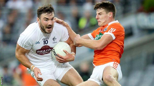 Armagh's Niall Grimley challenges Kildare's Fergal Conway