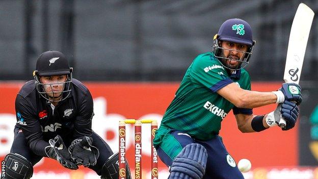 Simi Singh (right) attempts a reverse sweep in a one-day international against New Zealand at Malahide last month