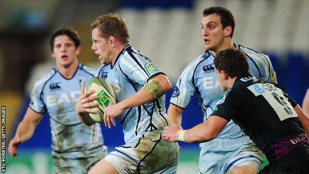 Rhys Thomas makes a break for Cardiff Blues