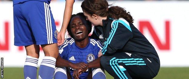 Eniola Aluko is consoled after Chelsea's 2-1 defeat at Manchester City in 2014