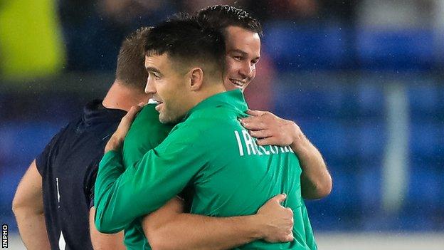 Johnny Sexton and Conor Murray embrace after Ireland's dominant win over Scotland