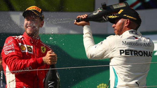 Sebastian Vettel and Lewis Hamilton on the podium at the Hungarian Grand Prix