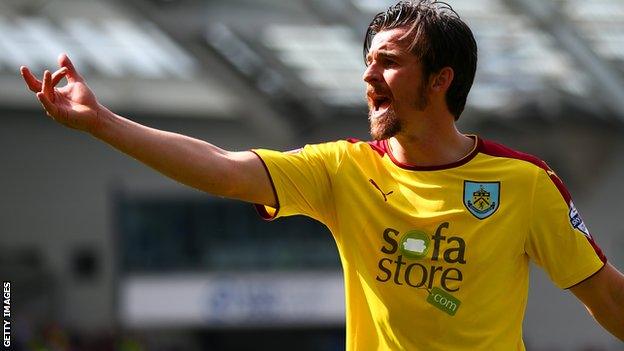 Joey Barton makes a point playing for Burnley against Brighton