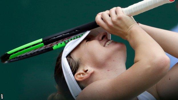 Simona Halep celebrates victory