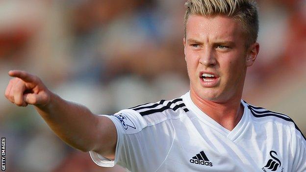 Adam King in action for Swansea City in pre-season