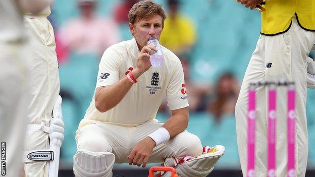 Joe Root drinking water during a drinks break in Australia