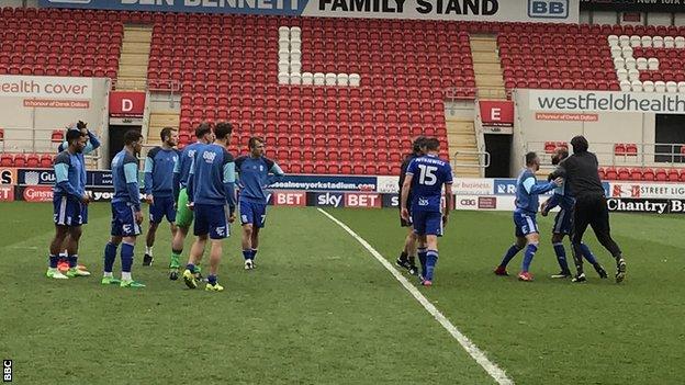 Birmingham City players argue after their draw at Rotherham United