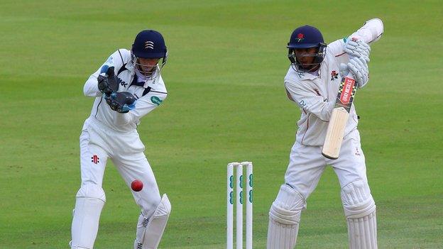 Middlesex wicketkeeper John Simpson watches Lancashire opener Haseeb Hameed carve ?? at Lord's