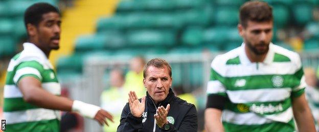 Celtic players and manager Brendan Rodgers