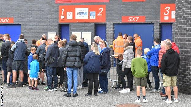 Fans at the turnstiles